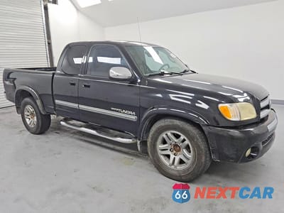 Czwarte zdjęcie samochodu z boku: 2003 TOYOTA TUNDRA SR5 VIN:5TBRT34163S393791 - miniatura