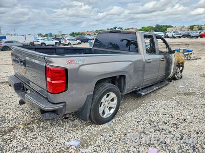 Trzecie zdjęcie samochodu z tyłu: 2017 CHEVROLET SILVERADO K1500 LT VIN:1GCVKREC7HZ177076 - miniatura
