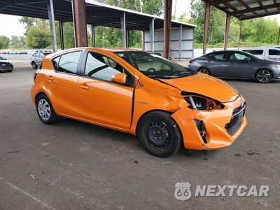 Czwarte zdjęcie samochodu z boku: 2015 TOYOTA PRIUS C TWO VIN:JTDKDTB39F1105404 - miniatura