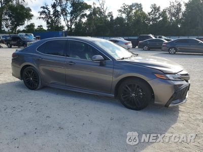 Czwarte zdjęcie samochodu z boku: 2024 TOYOTA CAMRY XSE VIN:4T1K61AK5RU878666 - miniatura