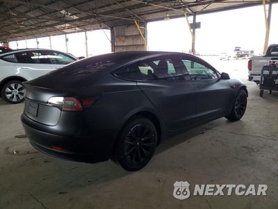 Trzecie zdjęcie samochodu z tyłu: 2023 TESLA MODEL 3 VIN:5YJ3E1EB8PF386323 - miniatura