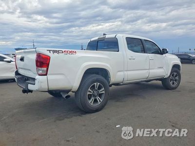 Trzecie zdjęcie samochodu z tyłu: 2018 TOYOTA TACOMA TRD SPORT VIN:3TMDZ5BN2JM041869 - miniatura