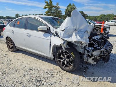 Czwarte zdjęcie samochodu z boku: 2018 FORD FOCUS SEL VIN:1FADP3H26JL265256 - miniatura