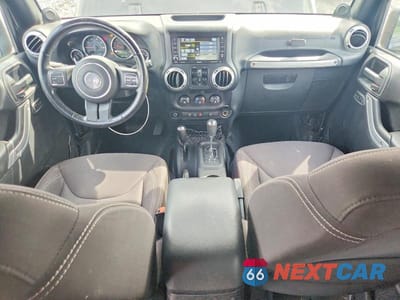Zdjęcie 8 z 12 samochodu: 2014 JEEP WRANGLER UNLIMITED RUBICON VIN:1C4BJWFG7EL145104 - miniatura