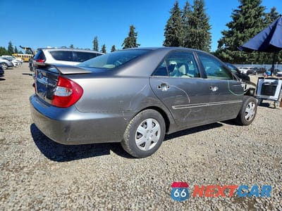 Trzecie zdjęcie samochodu z tyłu: 2003 TOYOTA CAMRY LE VIN:JTDBE32K230145183 - miniatura