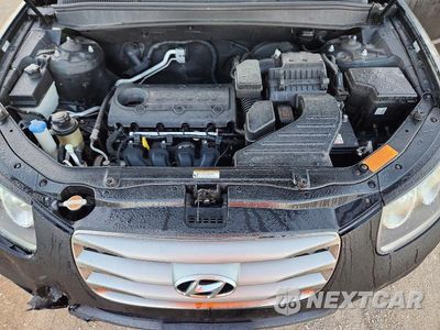 Zdjęcie 12 z 13 samochodu: 2012 HYUNDAI SANTA FE LIMITED VIN:5XYZK3AB9CG106657 - miniatura