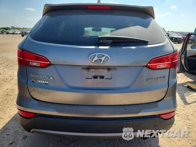 Zdjęcie 6 z 13 samochodu: 2014 HYUNDAI SANTA FE SPORT 2.0T VIN:5XYZU3LA7EG167118 - miniatura