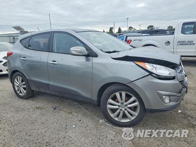 Czwarte zdjęcie samochodu z boku: 2010 HYUNDAI TUCSON LIMITED VIN:KM8JU3AC2AU053128 - miniatura