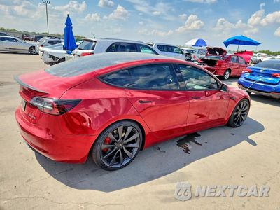 Trzecie zdjęcie samochodu z tyłu: 2020 TESLA MODEL 3 VIN:5YJ3E1EC4LF669594 - miniatura