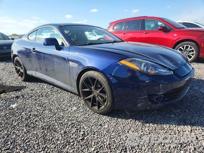 Czwarte zdjęcie samochodu z boku: 2007 HYUNDAI TIBURON GT VIN:KMHHN66F77U250465 - miniatura