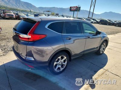 Trzecie zdjęcie samochodu z tyłu: 2017 HONDA CR-V EXL VIN:7FARW1H85HE046589 - miniatura