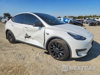 Czwarte zdjęcie samochodu z boku: 2020 TESLA MODEL Y VIN:5YJYGDEE0LF004372 - miniatura