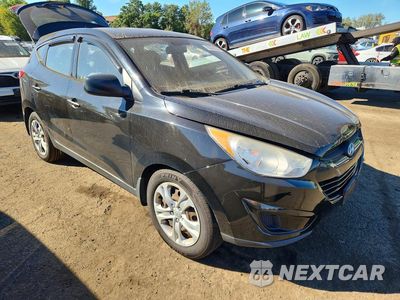 Czwarte zdjęcie samochodu z boku: 2011 HYUNDAI TUCSON GL VIN:KM8JT3AB9BU229264 - miniatura