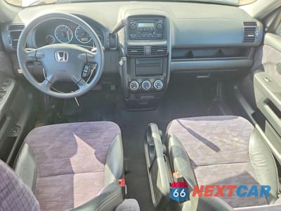 Zdjęcie 8 z 13 samochodu: 2002 HONDA CR-V LX VIN:JHLRD684X2C002459 - miniatura