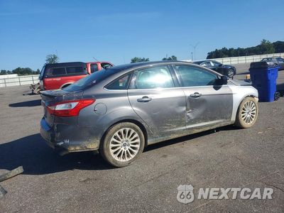 Trzecie zdjęcie samochodu z tyłu: 2012 FORD FOCUS TITANIUM VIN:1FAHP3J21CL365473 - miniatura