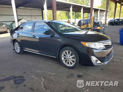 Czwarte zdjęcie samochodu z boku: 2012 TOYOTA CAMRY HYBRID XLE VIN:4T1BD1FK0CU017725 - miniatura