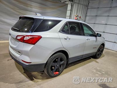 Trzecie zdjęcie samochodu z tyłu: 2019 CHEVROLET EQUINOX LT VIN:2GNAXVEX2K6163804 - miniatura