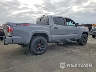 Trzecie zdjęcie samochodu z tyłu: 2020 TOYOTA TACOMA TRD SPORT VIN:3TMCZ5AN0LM360915 - miniatura