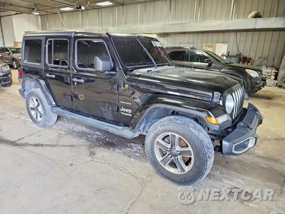 Czwarte zdjęcie samochodu z boku: 2019 JEEP WRANGLER UNLIMITED SAHARA VIN:1C4HJXEN6KW624656 - miniatura
