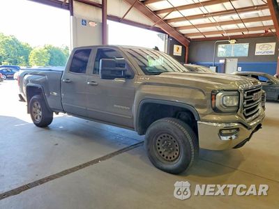 Czwarte zdjęcie samochodu z boku: 2017 GMC SIERRA K1500 SLE VIN:1GTV2MEHXHZ160979 - miniatura