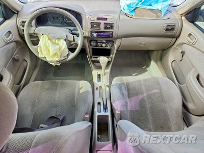 Zdjęcie 8 z 13 samochodu: 2002 TOYOTA COROLLA CE VIN:1NXBR12E02Z595727 - miniatura