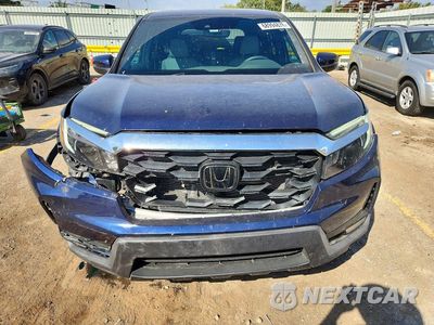 Piąte zdjęcie samochodu w środku: 2023 HONDA PASSPORT EXL VIN:5FNYF8H5XPB030652 - miniatura