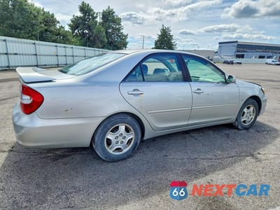 Trzecie zdjęcie samochodu z tyłu: 2003 TOYOTA CAMRY LE VIN:4T1BE32K33U217416 - miniatura