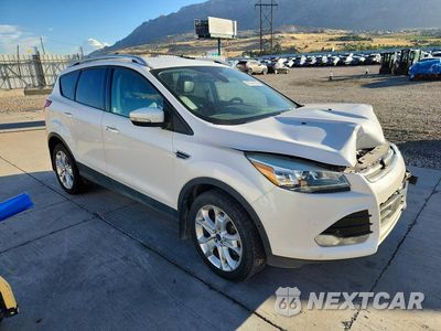 Czwarte zdjęcie samochodu z boku: 2014 FORD ESCAPE TITANIUM VIN:1FMCU9J90EUE52772 - miniatura