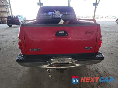 Zdjęcie 6 z 13 samochodu: 2000 FORD F150 VIN:2FTRX07L5YCA70858 - miniatura