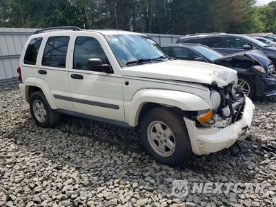 Czwarte zdjęcie samochodu z boku: 2007 JEEP LIBERTY SPORT VIN:1J4GL48K17W710304 - miniatura