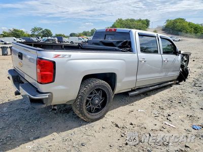 Trzecie zdjęcie samochodu z tyłu: 2015 CHEVROLET SILVERADO K1500 LT VIN:3GCUKREC7FG233946 - miniatura