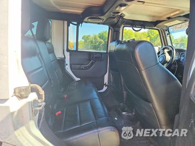 Zdjęcie 10 z 12 samochodu: 2012 JEEP WRANGLER UNLIMITED SAHARA VIN:1C4BJWEG4CL263559 - miniatura