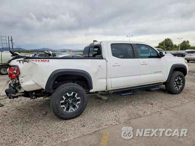 Trzecie zdjęcie samochodu z tyłu: 2023 TOYOTA TACOMA TRD OFF-ROAD VIN:3TMDZ5BN2PM145898 - miniatura
