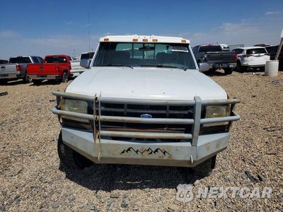 Piąte zdjęcie samochodu w środku: 1995 FORD F350 VIN:1FTJW36F2SEA24080 - miniatura