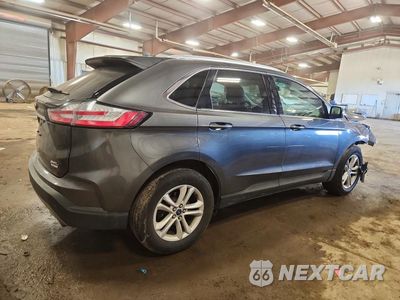 Trzecie zdjęcie samochodu z tyłu: 2019 FORD EDGE SEL VIN:2FMPK4J98KBB09011 - miniatura
