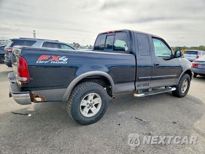 Trzecie zdjęcie samochodu z tyłu: 2002 FORD F150 VIN:2FTRX18L62CA65020 - miniatura