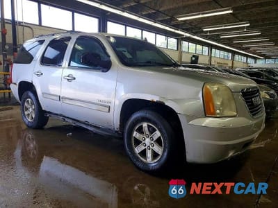 Czwarte zdjęcie samochodu z boku: 2010 GMC YUKON SLT VIN:1GKUKCE04AR123369 - miniatura