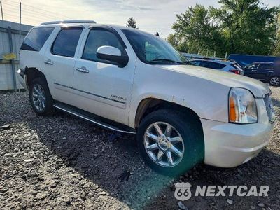 Czwarte zdjęcie samochodu z boku: 2010 GMC YUKON DENALI VIN:1GKUKEEF5AR289738 - miniatura