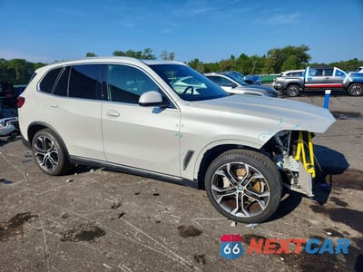 Czwarte zdjęcie samochodu z boku: 2022 BMW X5 XDRIVE40I VIN:5UXCR6C05N9N06295 - miniatura
