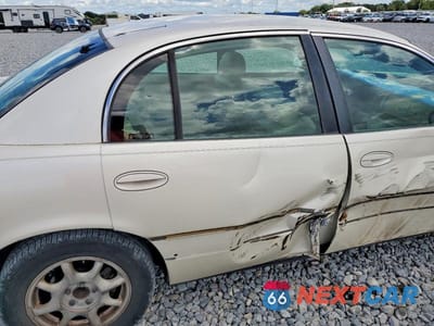 Zdjęcie 10 z 12 samochodu: 2002 BUICK PARK AVENUE VIN:1G4CW54K924193051 - miniatura