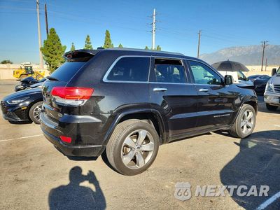 Trzecie zdjęcie samochodu z tyłu: 2016 JEEP GRAND CHEROKEE OVERLAND VIN:1C4RJECG1GC314503 - miniatura