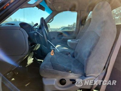 Zdjęcie 7 z 12 samochodu: 2000 FORD F150 VIN:1FTRX18L4YNB11463 - miniatura