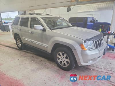 Czwarte zdjęcie samochodu z boku: 2010 JEEP GRAND CHEROKEE LIMITED VIN:1J4RR5GT4AC123238 - miniatura