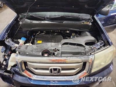 Zdjęcie 11 z 12 samochodu: 2011 HONDA PILOT LX VIN:5FNYF4H20BB082203 - miniatura