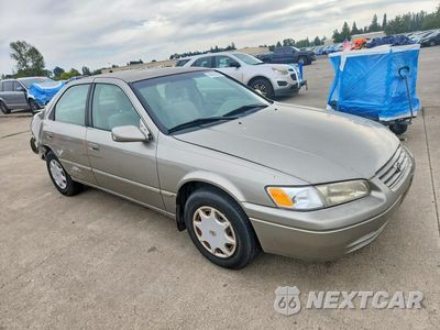 Czwarte zdjęcie samochodu z boku: 1997 TOYOTA CAMRY LE VIN:JT2BG22K9V0091719 - miniatura