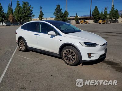 Czwarte zdjęcie samochodu z boku: 2016 TESLA MODEL X VIN:5YJXCDE24GF026166 - miniatura
