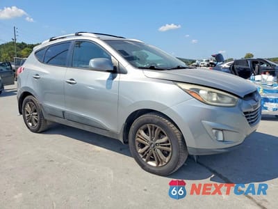 Czwarte zdjęcie samochodu z boku: 2015 HYUNDAI TUCSON SE VIN:KM8JUCAG4FU031058 - miniatura