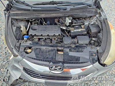 Zdjęcie 12 z 13 samochodu: 2012 HYUNDAI TUCSON LIMITED VIN:KM8JUCAC0CU445107 - miniatura