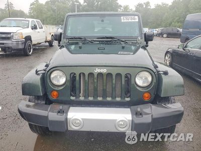 Piąte zdjęcie samochodu w środku: 2011 JEEP WRANGLER UNLIMITED SAHARA VIN:1J4BA5H18BL633972 - miniatura