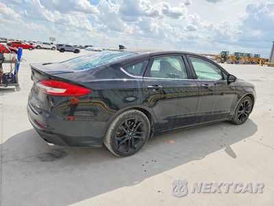 Trzecie zdjęcie samochodu z tyłu: 2019 FORD FUSION SE VIN:3FA6P0HDXKR231686 - miniatura